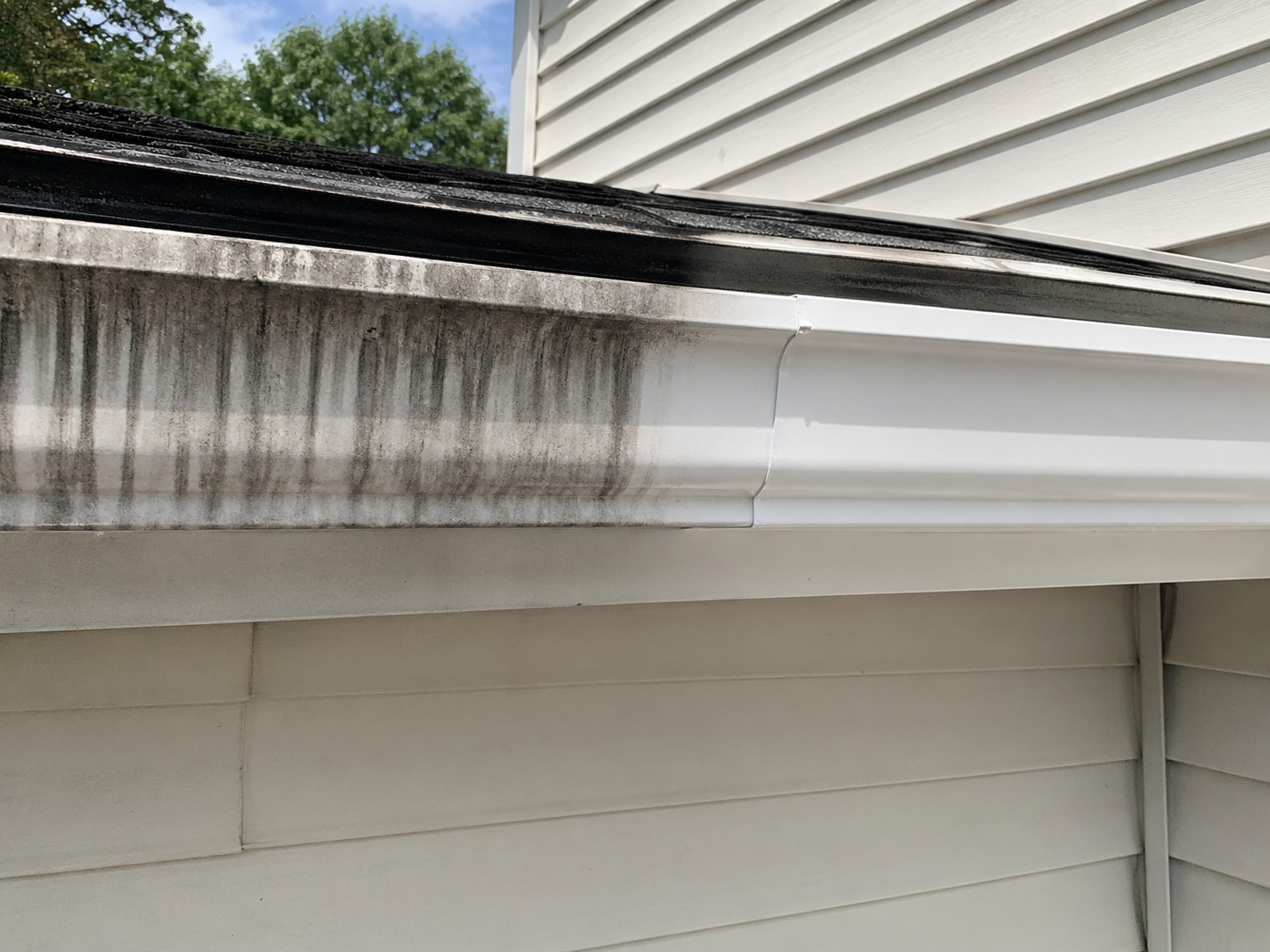 Gutter brightening before and after showing tiger-stripe oxidation removal
